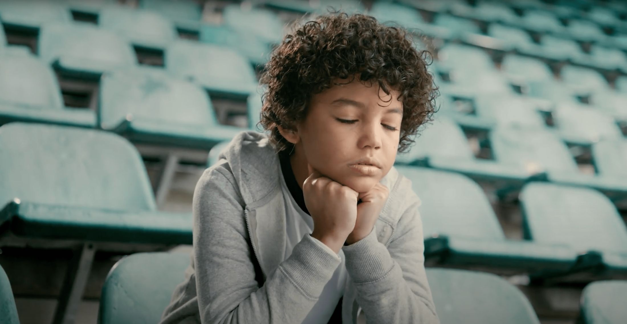 boy in stands