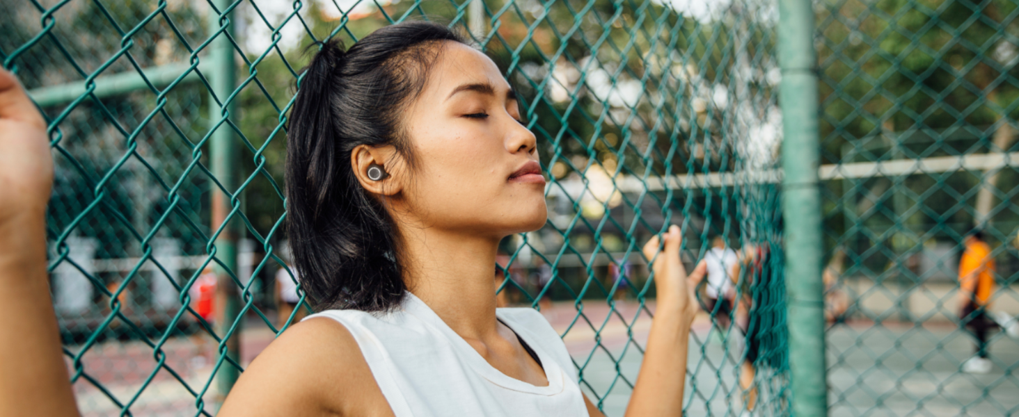 Amazon JBL Woman with in ear headphones