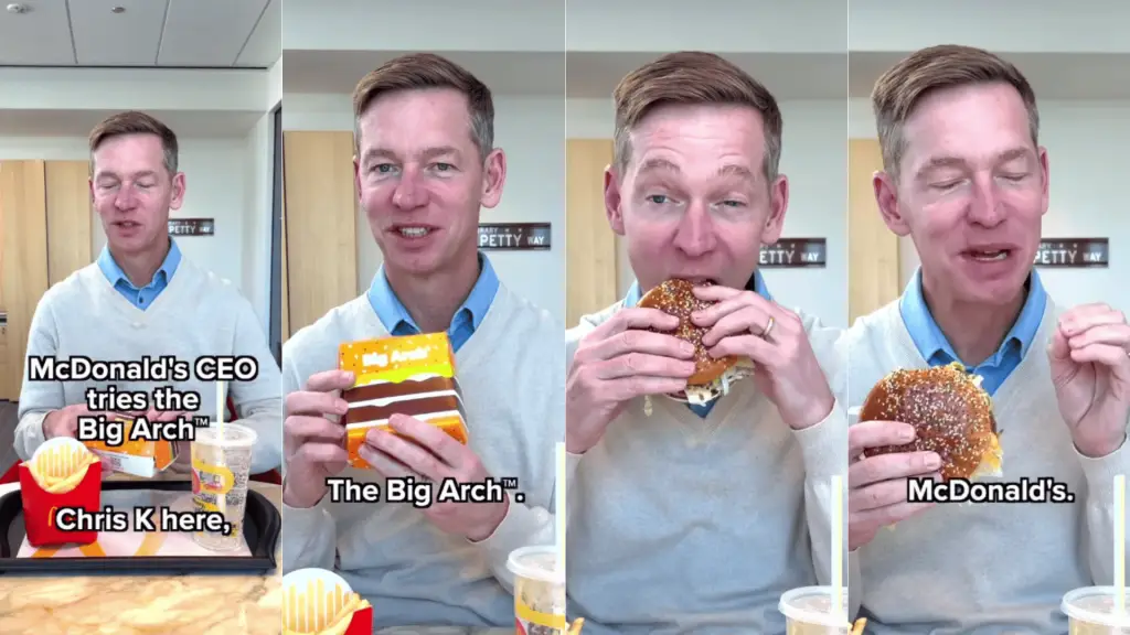 McDonald's CEO taking a burger bite